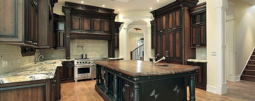 Kitchen with dark cabinetry